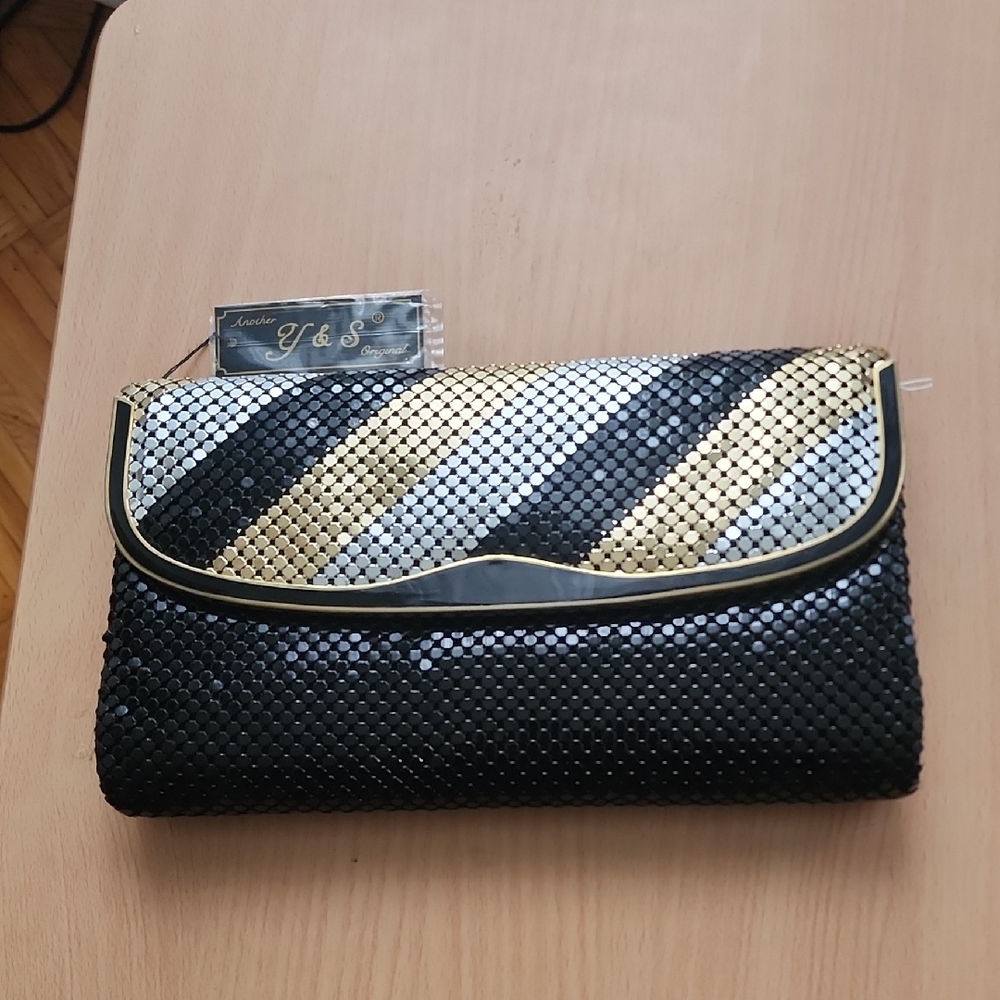 Elegant Black and Gold Striped Clutch